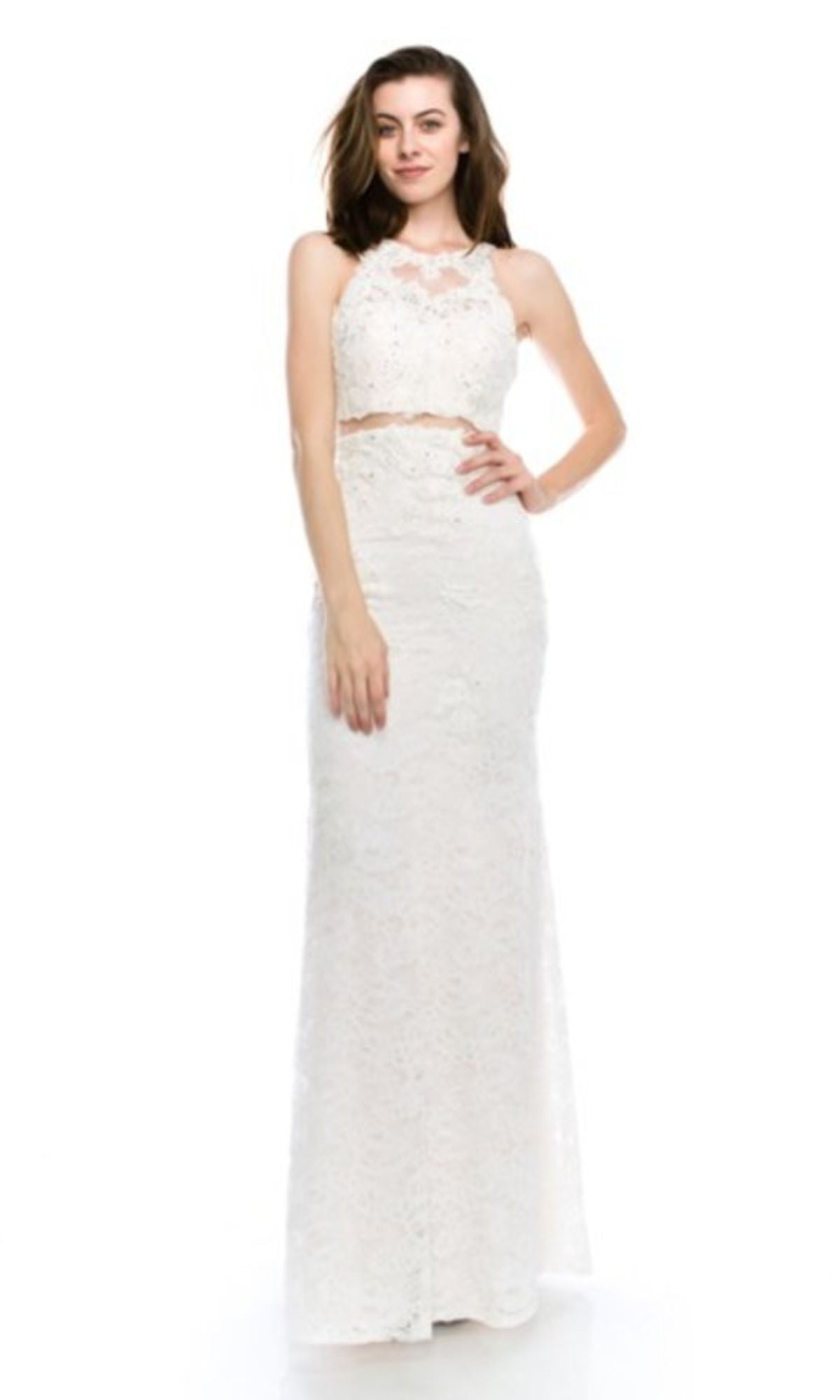 A woman wears the Chicas CR4225 Mock Two-Piece Long Lace Prom Dress, a sleeveless, high-neck white embroidered lace mermaid gown with a fitted skirt, posing against a plain white background.
